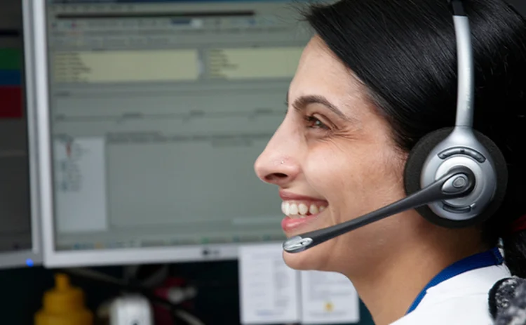 A smiling call centre worker