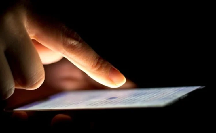 A smartphone being used in the dark