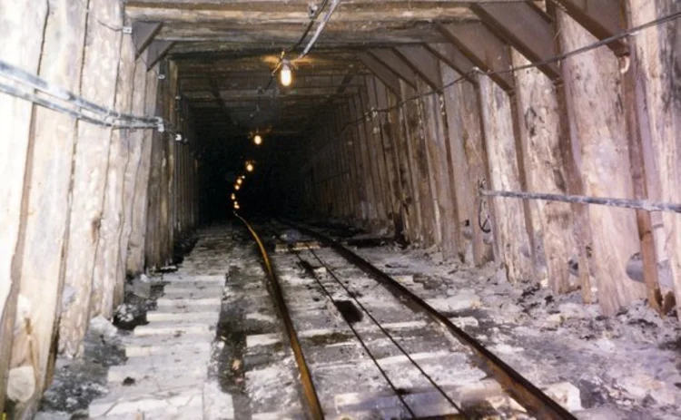 Entrance to a coal mine with cart tracks