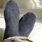 A man wearing black socks has his feet up A man wearing black socks has his feet up