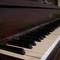 An upright piano keyboard An upright piano keyboard