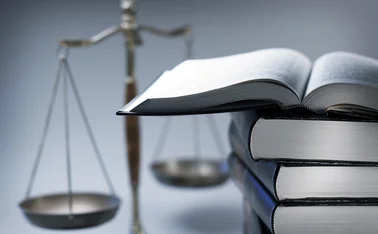 Scales of justice and law books