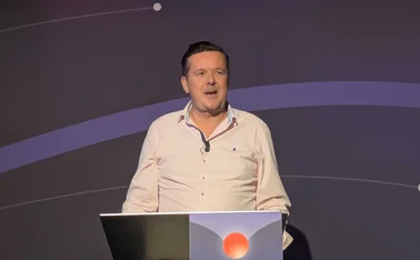 Dan Bishop, head of data at Hiscox UK, speaking at lectern