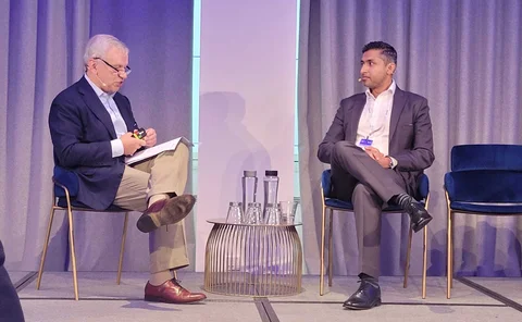Verisk CEO Lee Shavel and Allianz UK's Akhil Lalwani