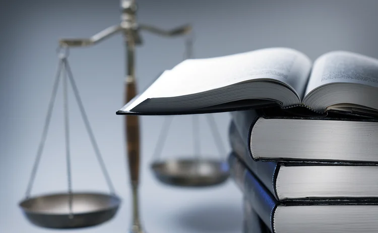 Scales of justice and law books