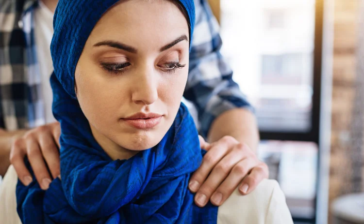 Muslim woman being harassed by white man