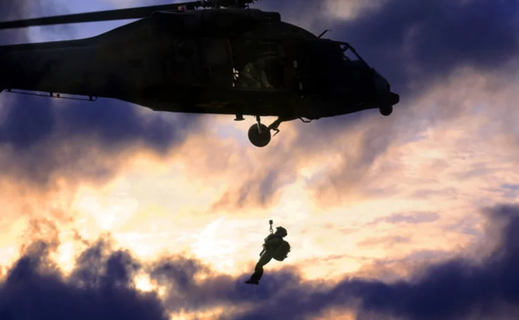 military-air-ambulance-rescue-soldier-hanging-from-helicopter