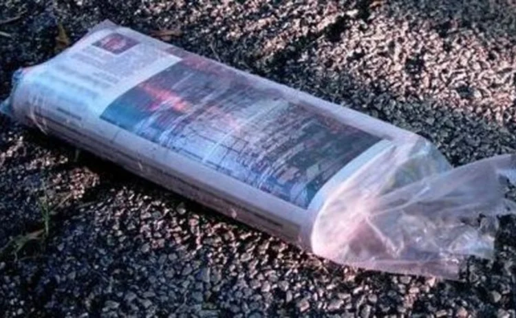 newspaper in plastic wrapper
