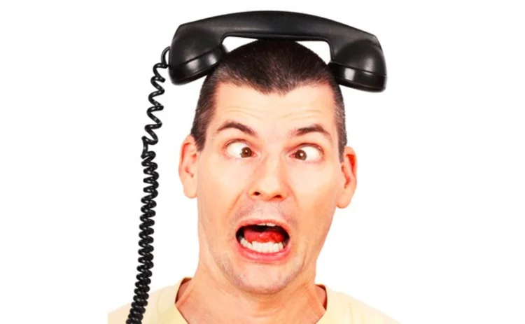 Man with a telephone on his head
