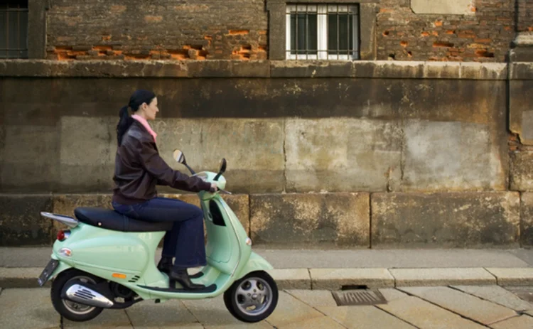Italian woman on a scooter