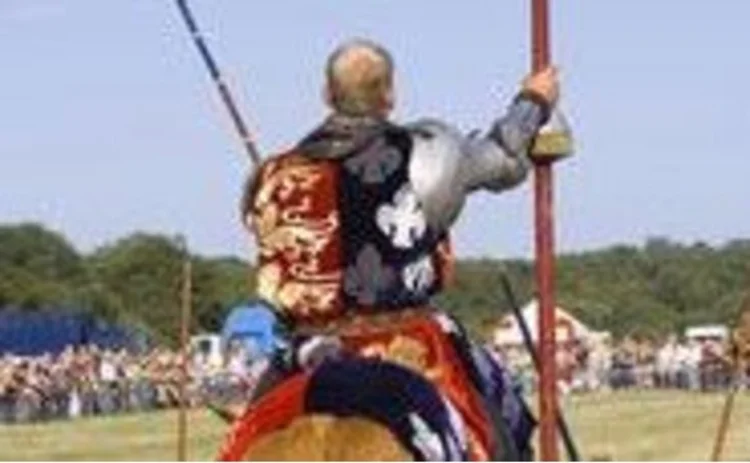 Mounted standard bearer at a historical reenactment event