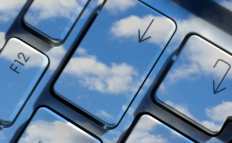 Clouds superimposed on a computer keyboard