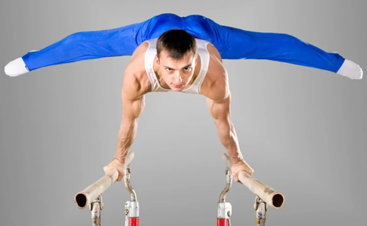 Agile gymnast on parallel bars