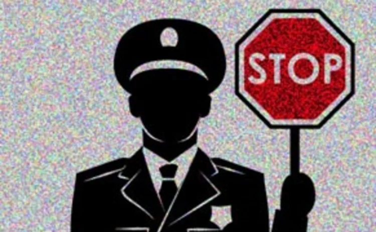 A policeman with a stop sign