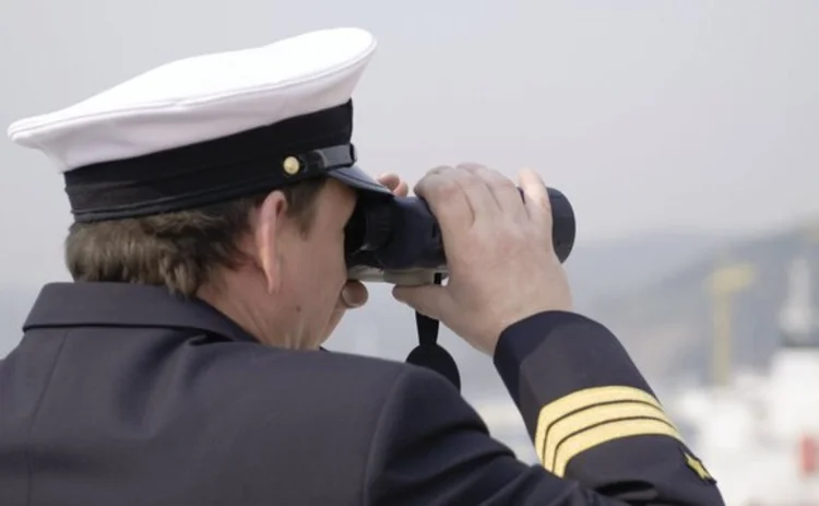 Naval officer with binoculars
