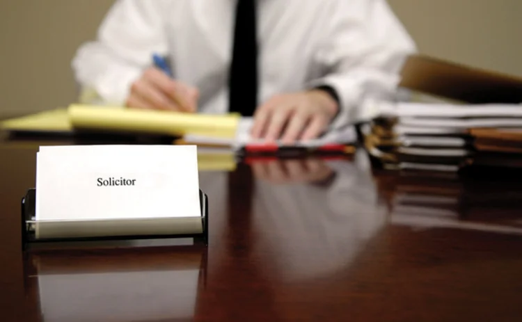 solicitor-at-desk