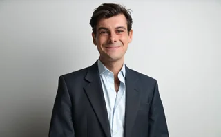 James Rendell CEO and founder of BirdEyeView stood against a white wall.