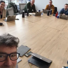 Iain Brumpton’s team in a meeting