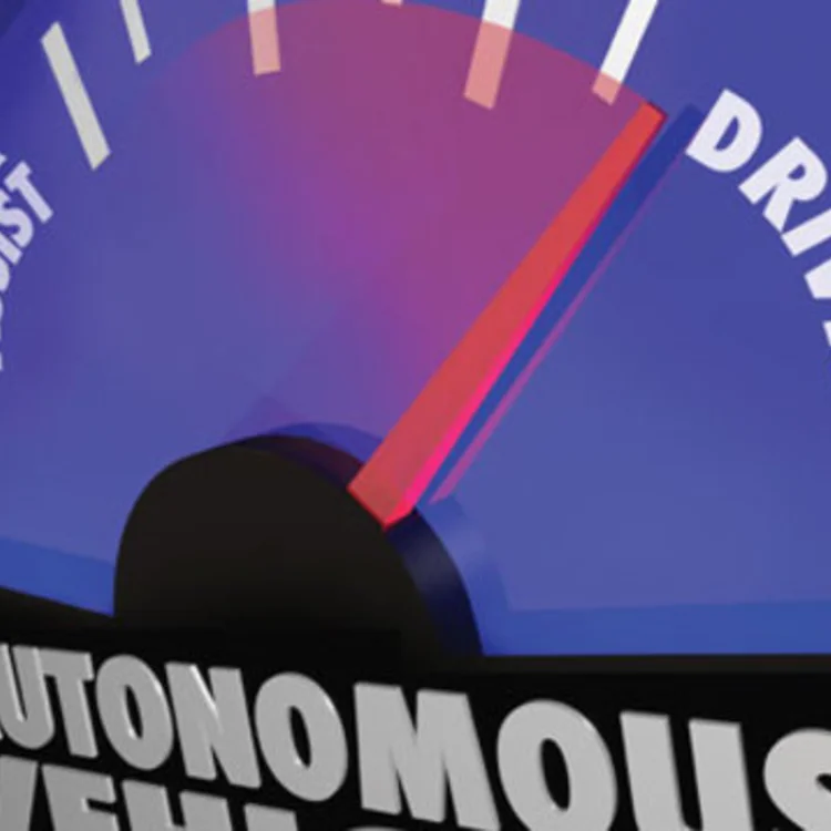 An autonomous vehicle dial with the needle pointing more towards self-driving than driver assist