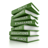 Regulations and compliance book stack - ESG concept