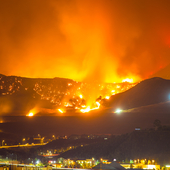 Night long exposure photograph of the Santa Clarita wildfire in CA. The Santa Clarita Valley mountains has drawn firefighters and emergency crews in the hills toward Acton. So far, the fire has burned 38,346 acres.